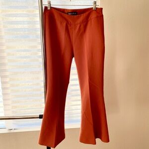 Pumpkin orange bell-bottom pants
